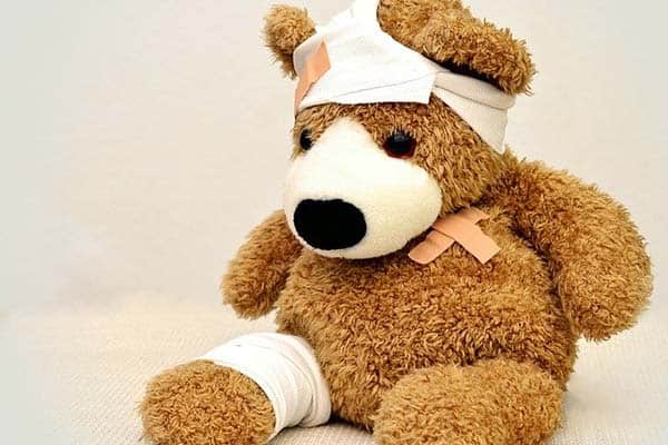 Image of a bandaged teddy bear