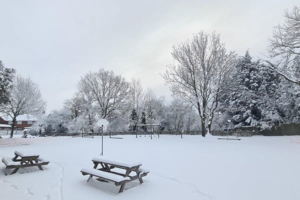 Photograph of school grounds in the snow